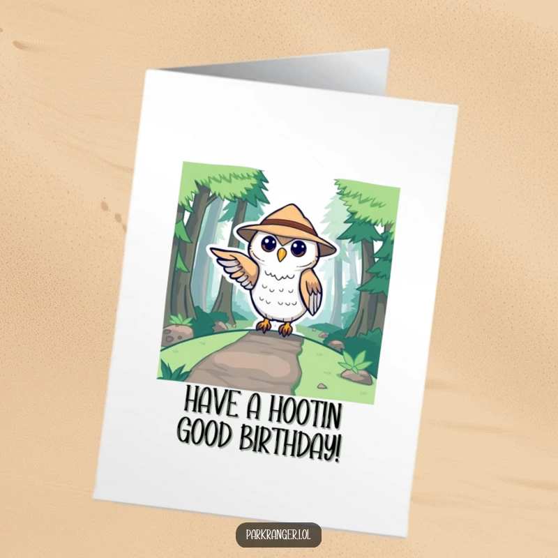 Cute Free Printable Birthday Card featuring a stylized owl ranger in a hat pointing towards a forest path, ready for adventure.