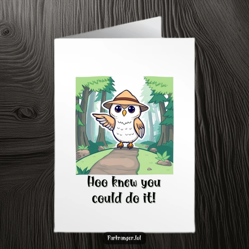 Cute Free Printable Congratulations Card with an owl ranger in a hat pointing a wing towards a forest path, celebrating success.