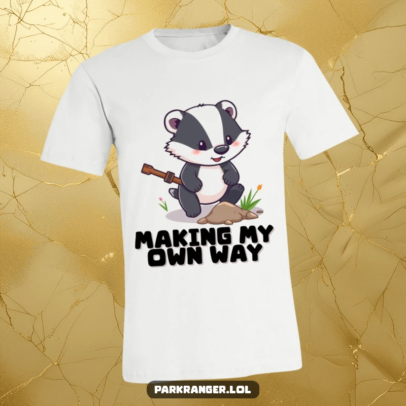 Funny T-Shirt featuring a determined badger character actively clearing a small path, symbolizing perseverance and hard work.