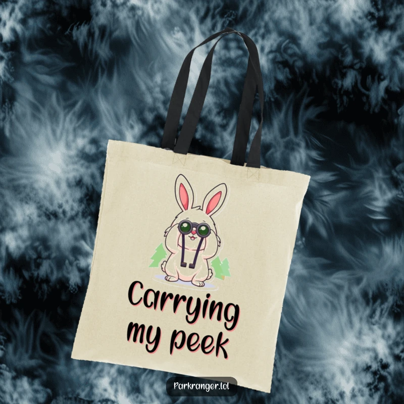 Funny tote bag with a cheerful, fluffy rabbit character using binoculars to look at distant trees, a whimsical and practical bag.